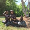 SRB41068-Vignette.jpg Bronze Kids and Dog on Log Sculpture