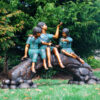 SRB48755-Bronze-Children-on-Log-with-Butterflies-Sculpture-by-Metropolitan-Galleries-Inc.jpg Bronze Children on Log with Butterflies Sculpture