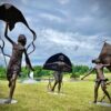 Bronze Boy Flying Kite Sculpture