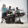 Bronze Boys Fishing on Log Sculpture
