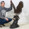 SRB055848-Bronze-Eagle-Catching-Fish-Sculpture-on-Marble-Base-by-Metropolitan-Galleries-Inc-SCALE-WM.jpg Bronze Eagle catching Fish Sculpture
