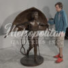 Bronze Boy Flying Kite Sculpture