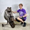 Bronze Bear riding Tricycle Sculpture