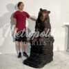 Bronze Bear Sitting on Rock Sculpture